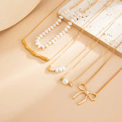 Pearl Baroque Bow Necklace - VEYAROSE